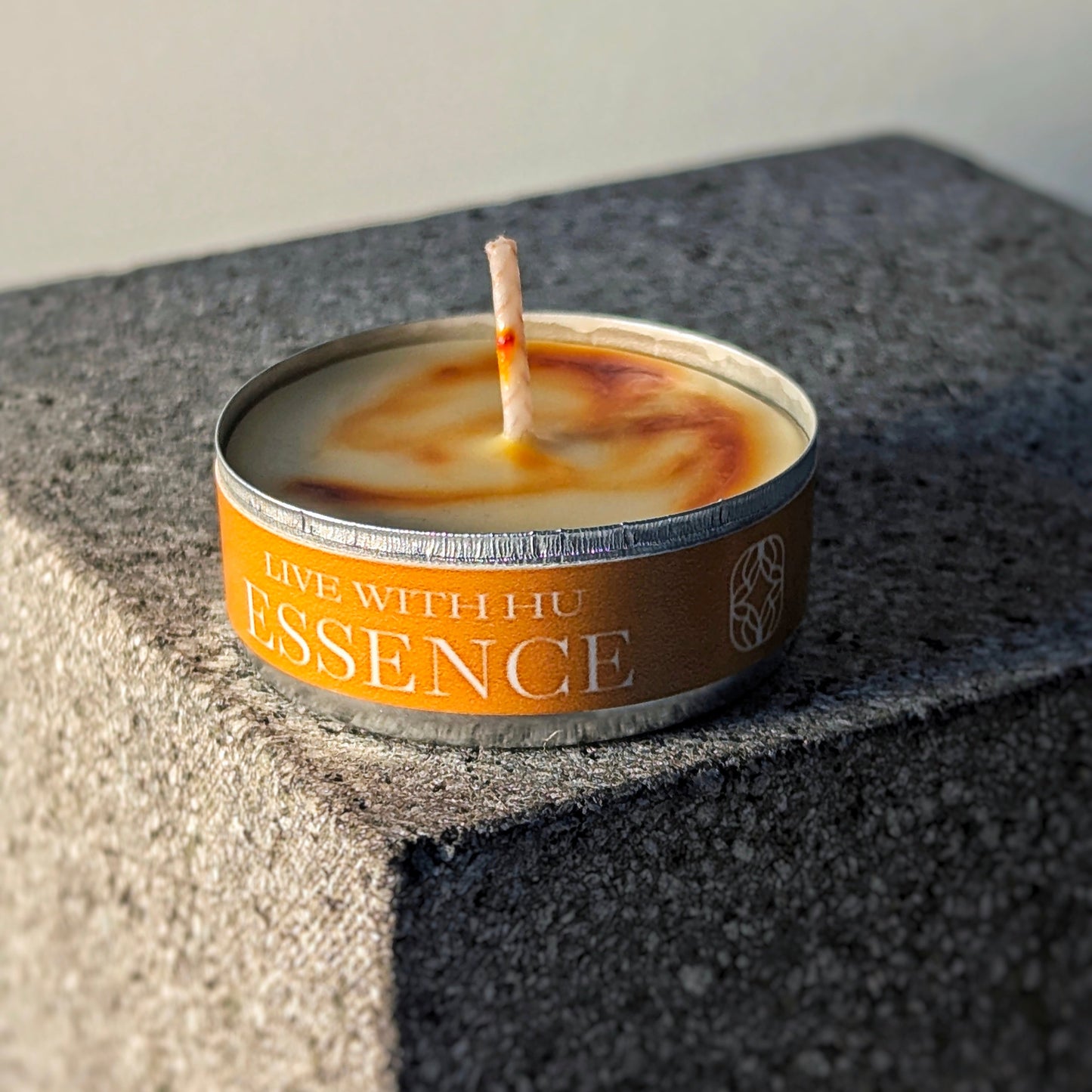 Single tealight candle in signature scent - essence. Oriental Spices inspired warm and rich scent.