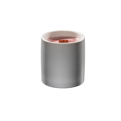 The portrait shot of the blaze candle, on a white background. Luxury, elegant, beautiful.