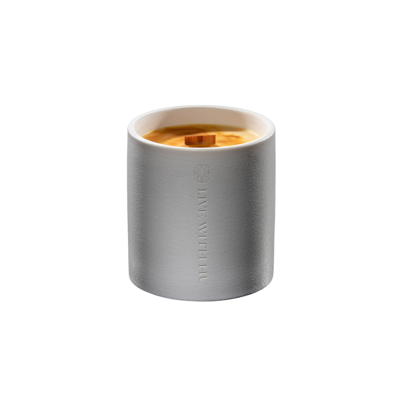 essence candle portrait in white background. The ceramic vessel is timeless and elegant, the aesthetically blended yellow wax gives you a sense of warmness, comfort, and connection.